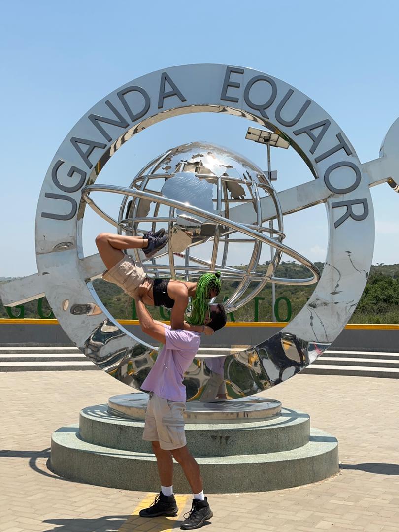 Tourists at the Uganda Equator crossing monument